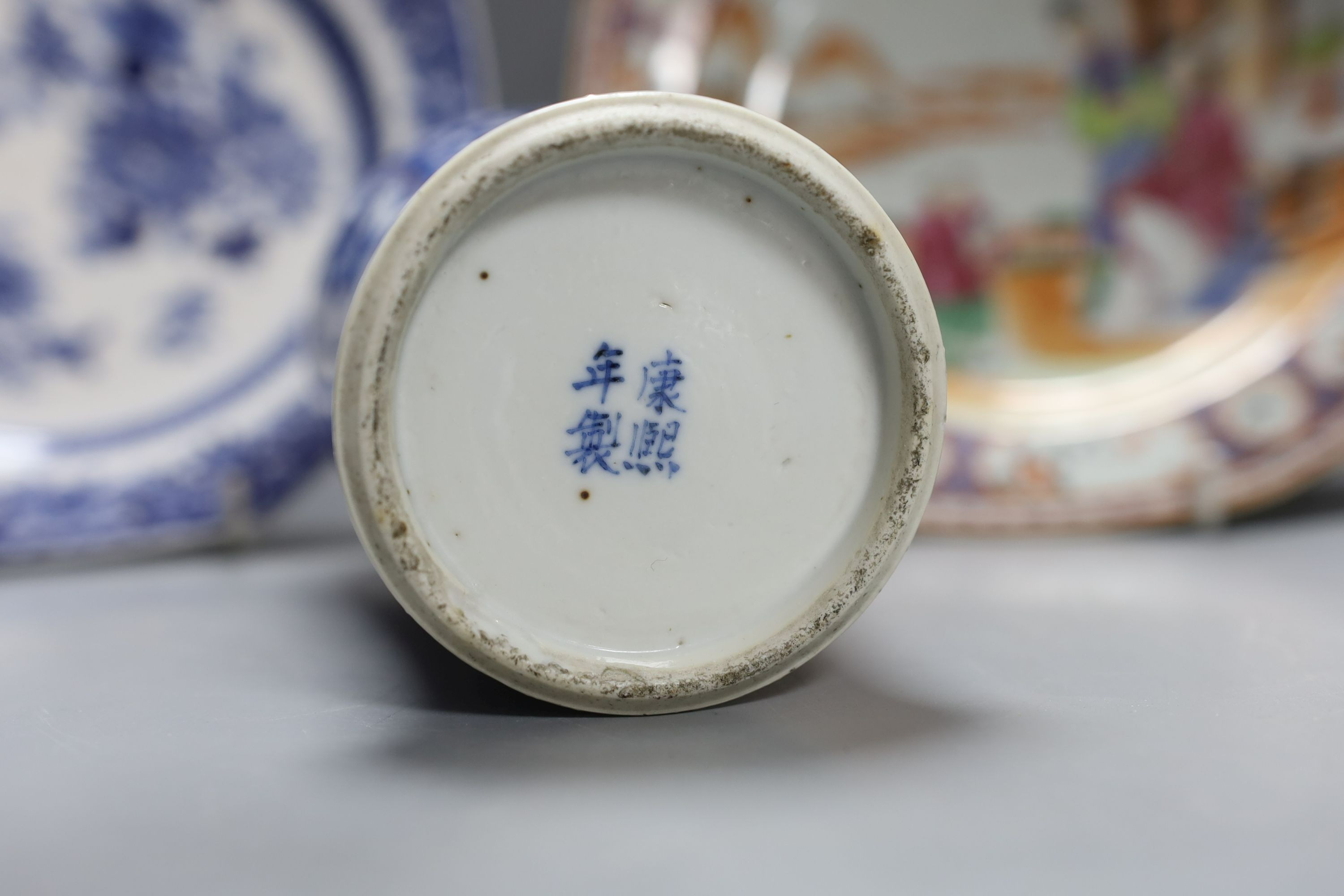 An 18th century Chinese export blue and white plate and dish, a blue and white vase and a famille rose plate